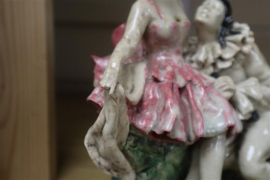 A 1920s/30s art pottery group of Pierrot and Columbine, indistinctly signed to the base, height 19cm